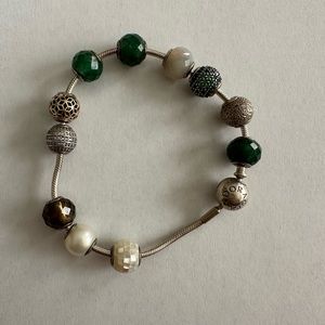 Pandora Essence collection bracelet and 11 charms